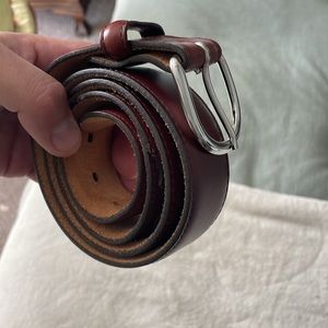 Men’s size 38 New Justin dark brown belt.